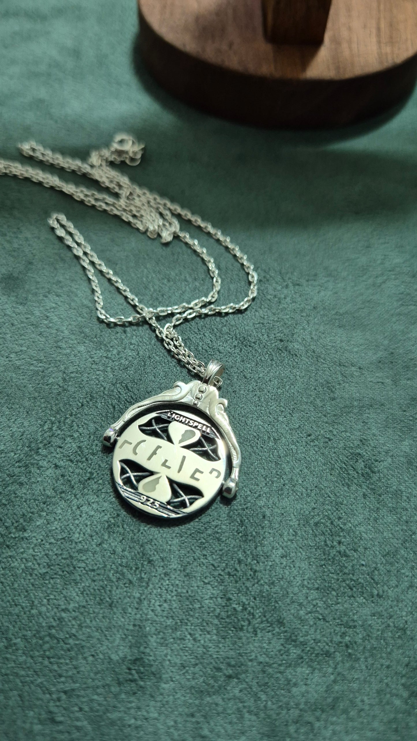 Forever" Glowing Spinning Secret Message Pendant