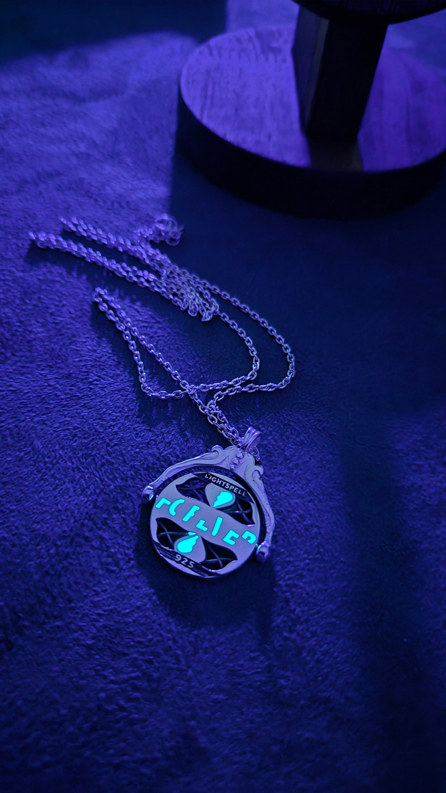 Forever" Glowing Spinning Secret Message Pendant