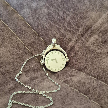 Glow-in-the Dark Spinning Secret Message Pendant